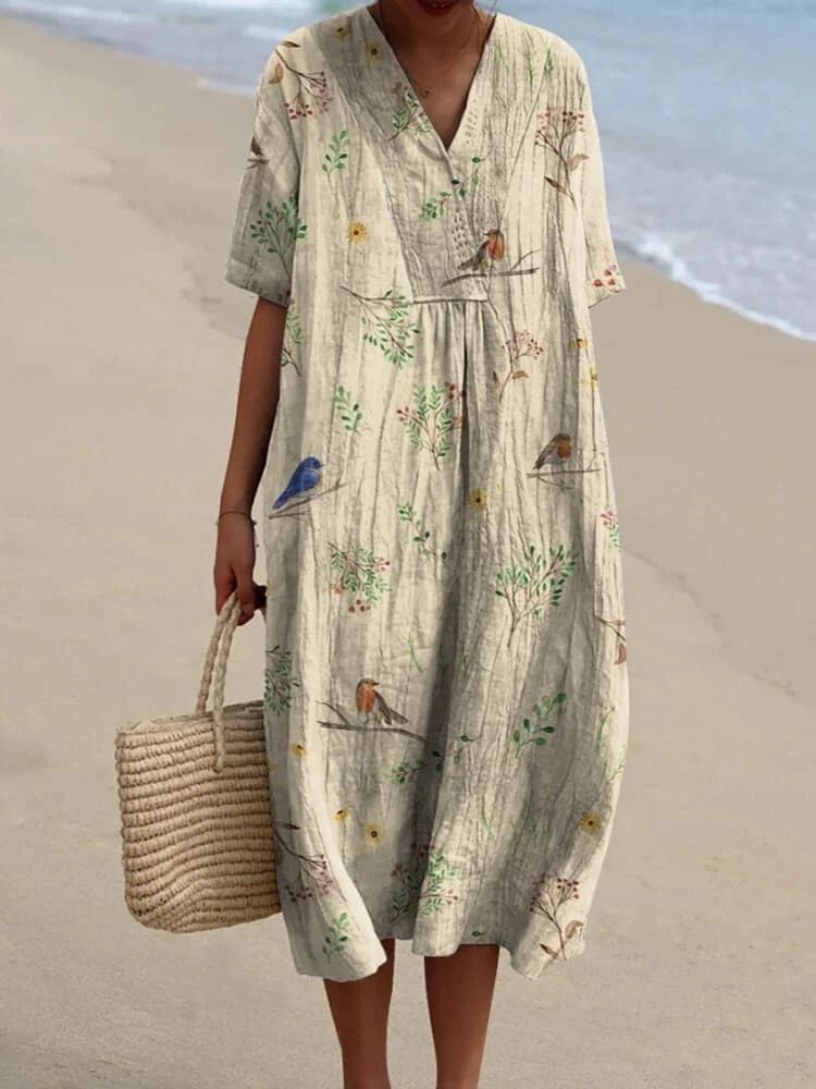 Stella | Dress with vibrant floral pattern