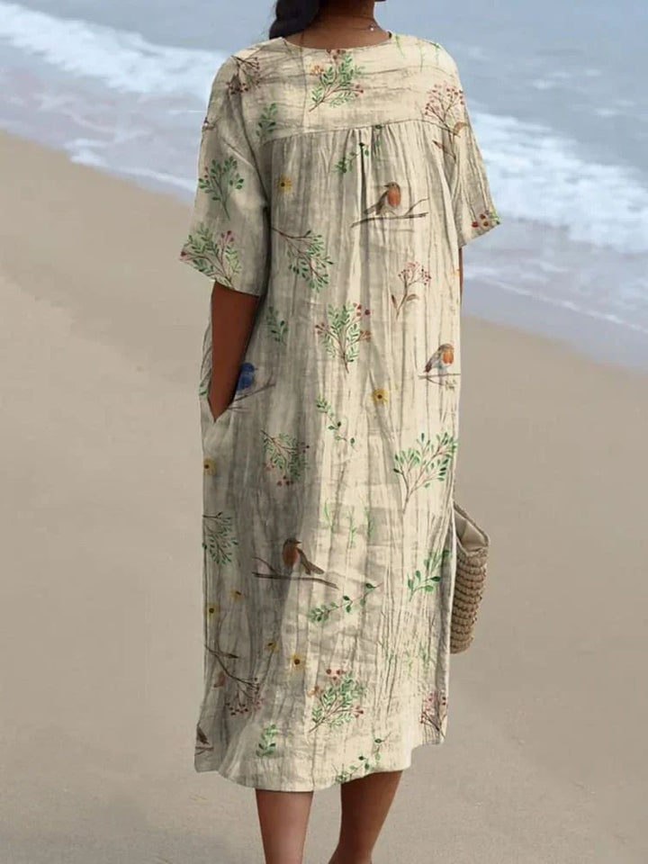 Stella | Dress with vibrant floral pattern