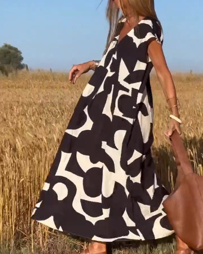 Emeline | Dress with print and V-neckline