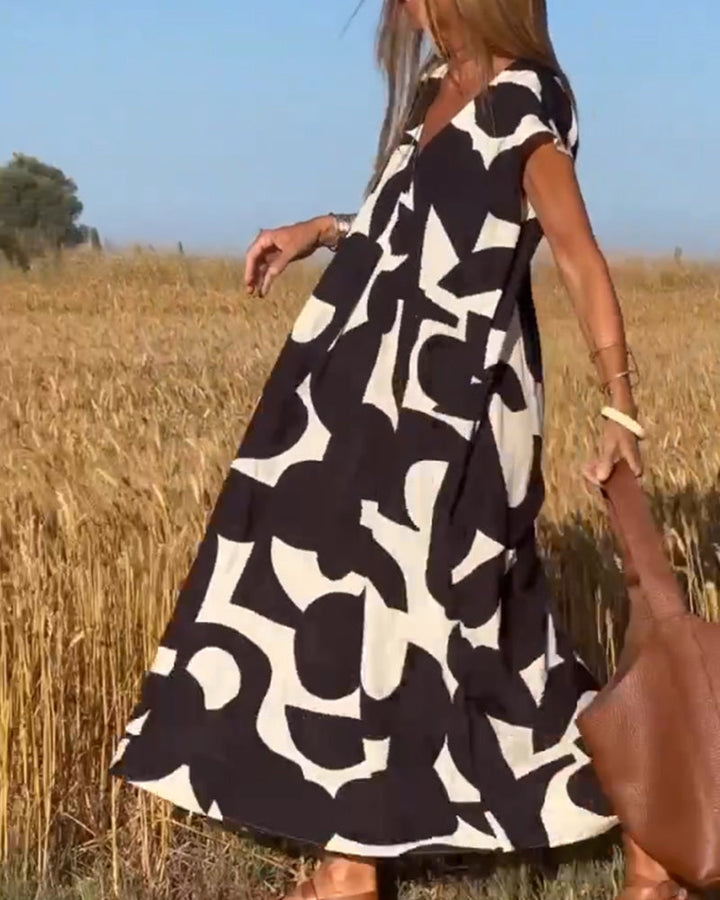 Emeline | Dress with print and V-neckline