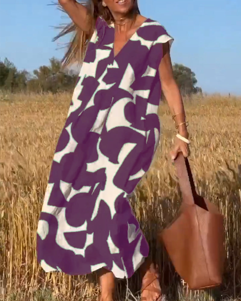 Emeline | Dress with print and V-neckline
